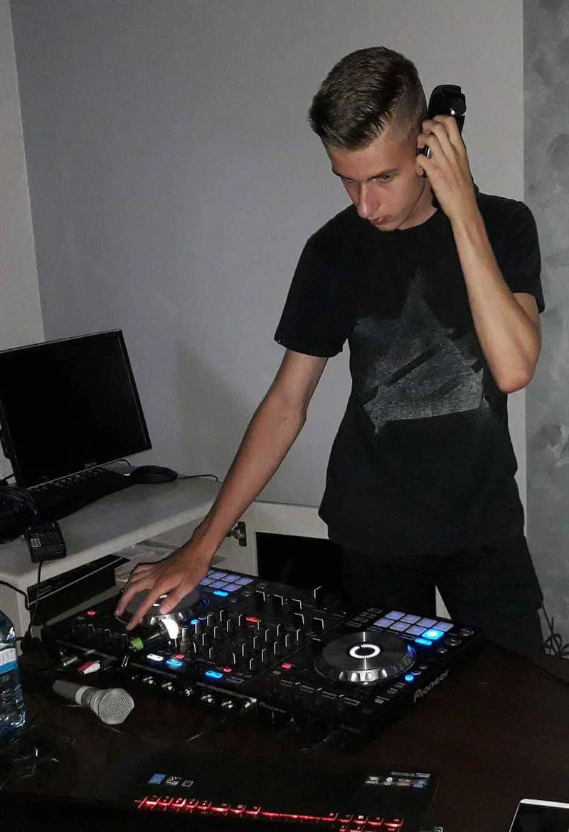 DJGear2K creator at a DJ setup